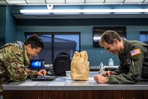 Airmen prepare for flight