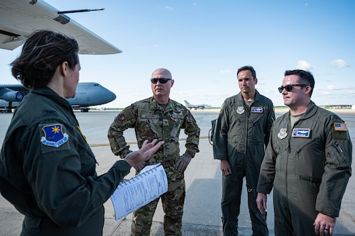 Airmen talk in group