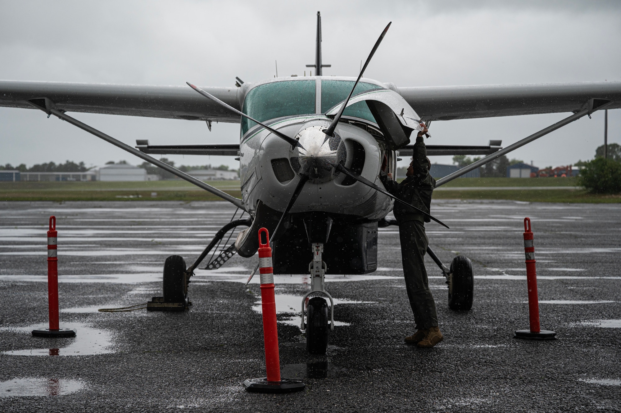 Airman works on airplane