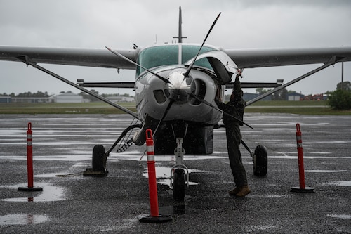 Airman works on airplane