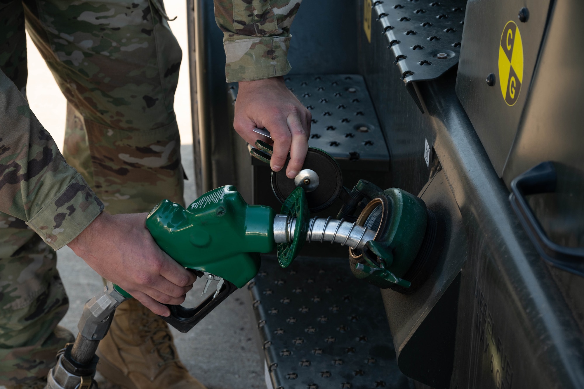 An Airman from the 5th Munitions Squadron (5MUNS) refuels a fork lift with a C-300 mobile fuel vehicle during a 5MUNS capability exercise (CAPEX) at Minot Air Force Base, North Dakota, June 24, 2025. During the CAPEX, forklifts were able to move the munitions safely and efficiently because of the fuel provided by the 5th Logistics Readiness Squadron petroleum, oil and lubricant flight. (U.S. Air Force photo by Airman 1st Class Wesley Davies)
