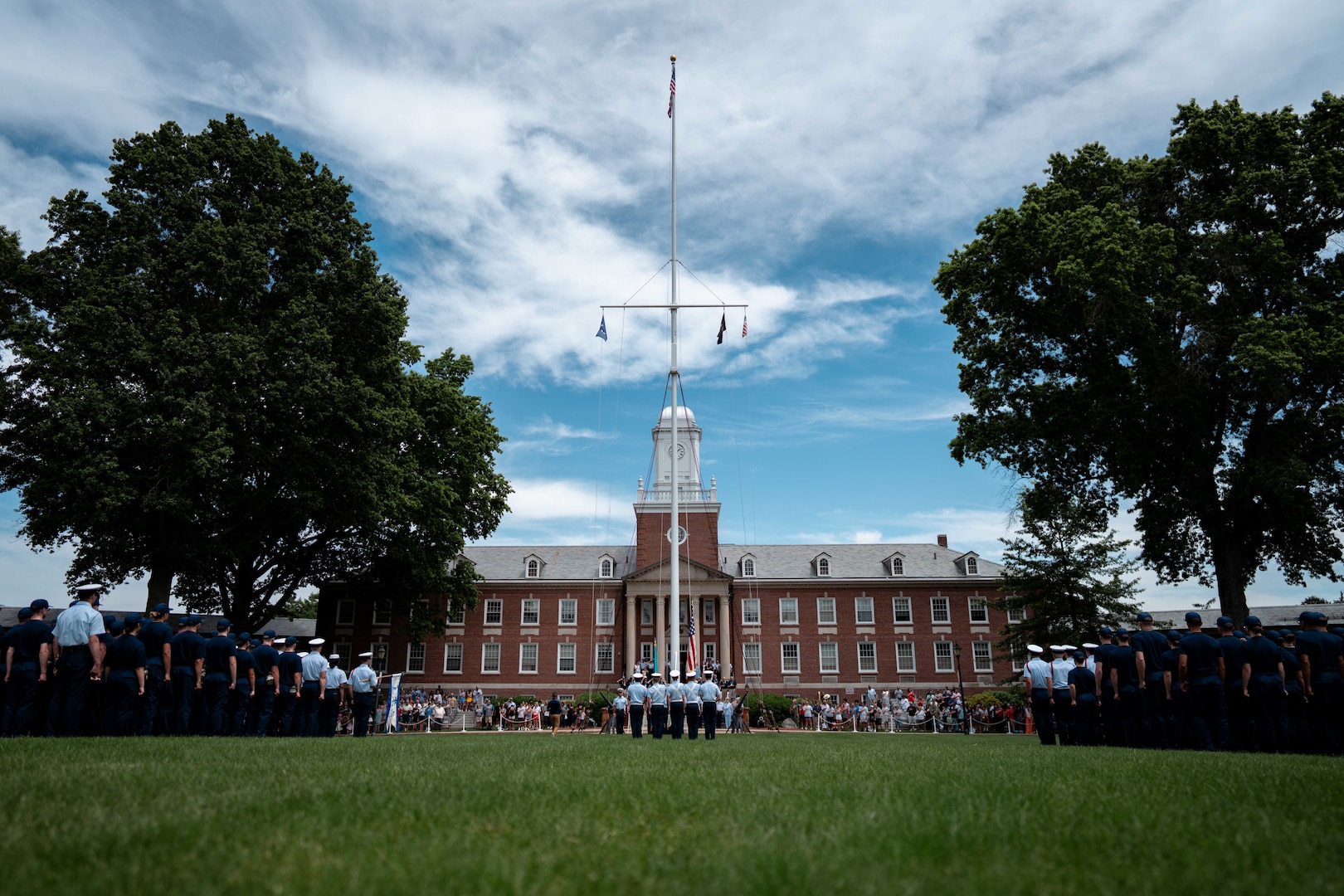 U.S. Coast Guard Academy (USCGA) cadets stand in formation on Washington Parade Field during Day One at USCGA, New London, Connecticut, June 30, 2025. Day One marks the start of Swab Summer, an intensive seven-week program that prepares students for military and Academy life. (U.S. Coast Guard photo by Petty Officer 3rd Class Matt Thieme)