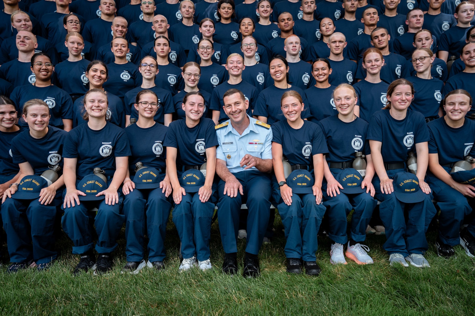 U.S. Coast Guard Rear Adm. Gregory Rothrock poses for a photo with members of the U.S. Coast Guard Academy (USCGA) Class of 2029 during Day One at USCGA, New London, Connecticut, June 30, 2025. Day One marks the start of Swab Summer, an intensive seven-week program that prepares students for military and Academy life. (U.S. Coast Guard photo by Petty Officer 3rd Class Matt Thieme)