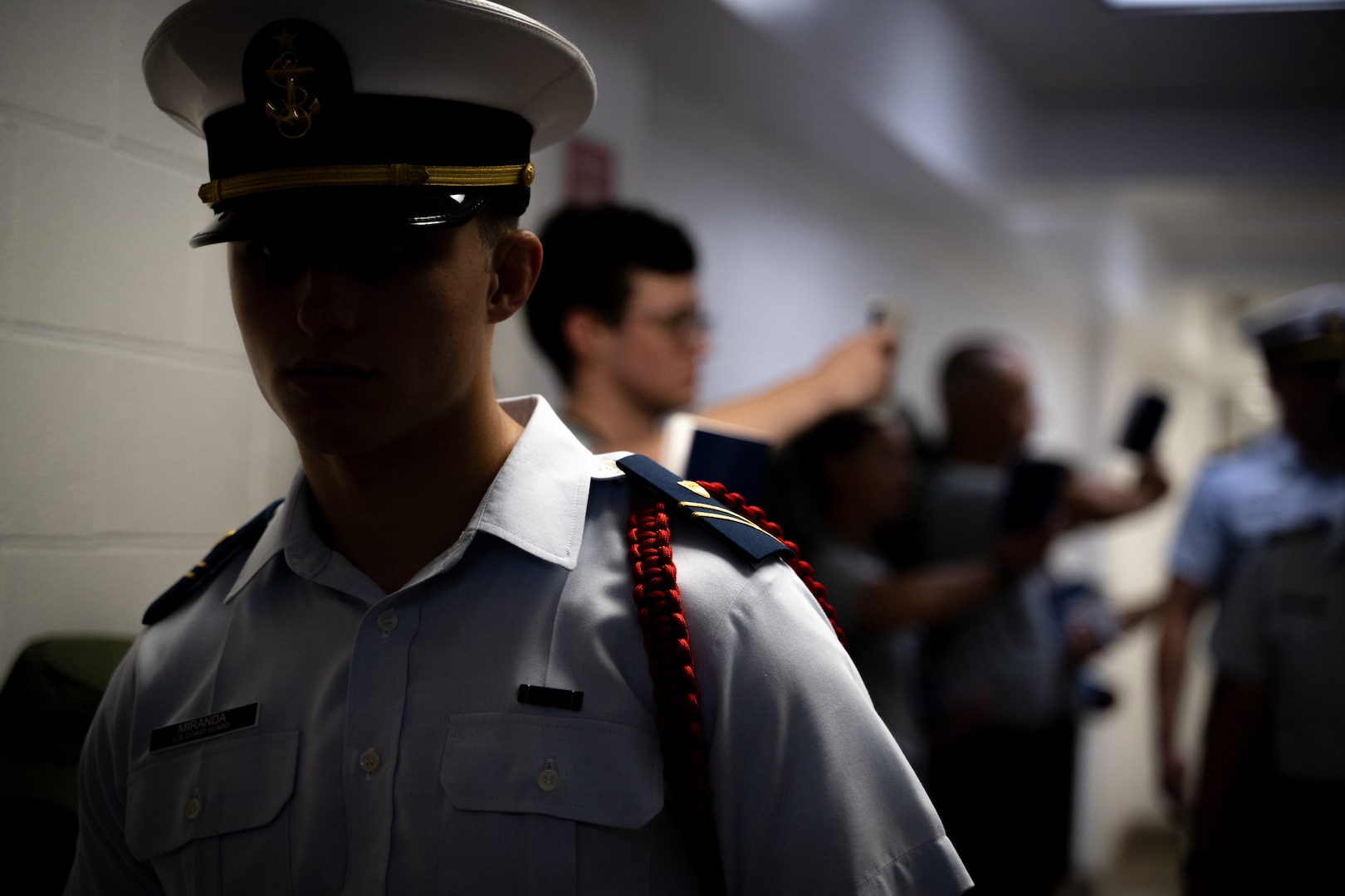 U.S. Coast Guard Academy (USCGA) a cadet cadre member supervises the Class of 2029 2029 during Day One at USCGA, New London, Connecticut, June 30, 2025. Day One marks the beginning of a seven-week training program that transforms swabs into cadets. (U.S. Coast Guard photo by Petty Officer Third Class Leo Avila.)