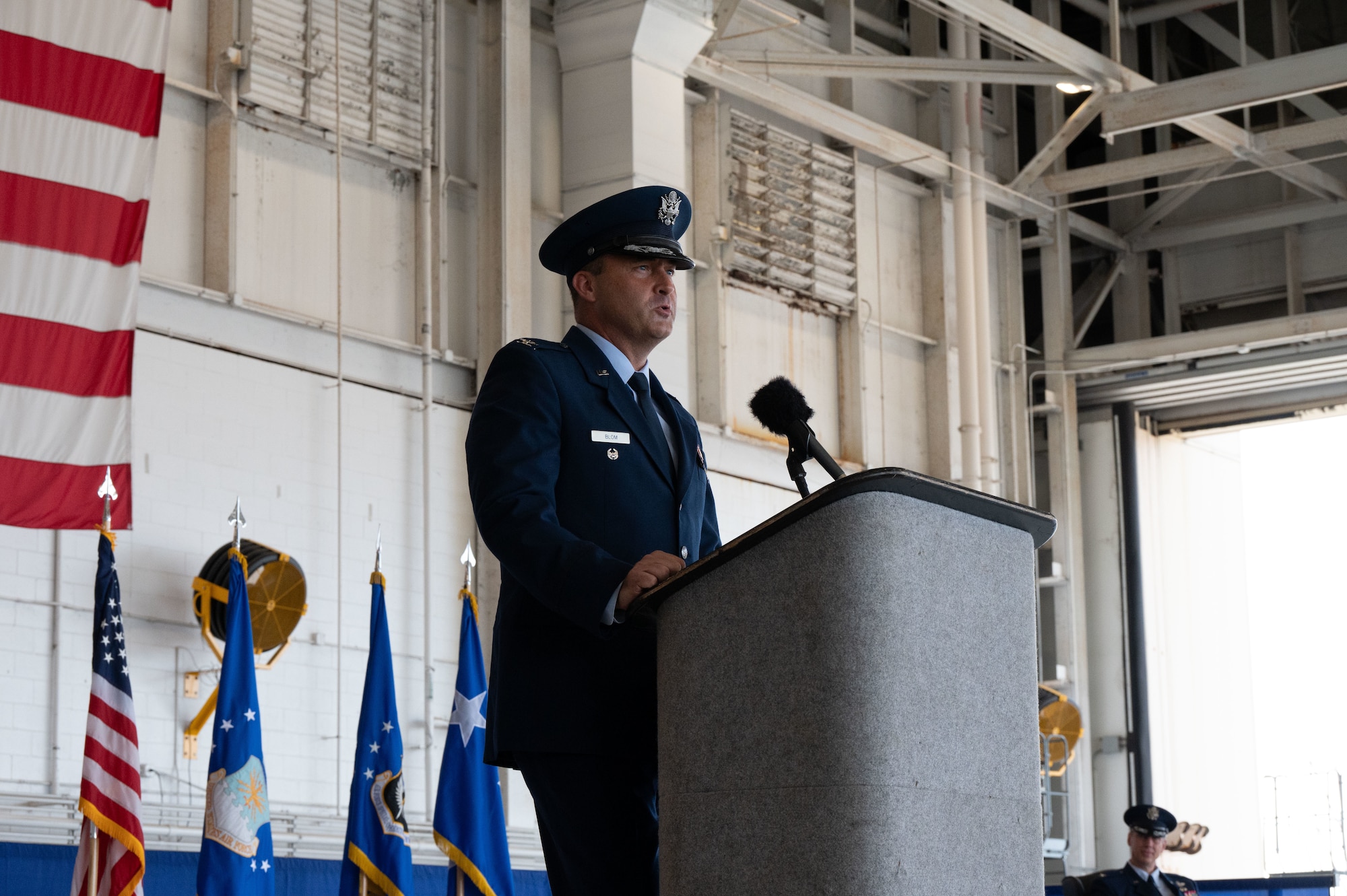 U.S. Air Force Col. Zach Blom, incoming 492nd Special Operations Wing commander, delivers his first remarks during a change of command ceremony at Hurlburt Field, Florida, June 27, 2025