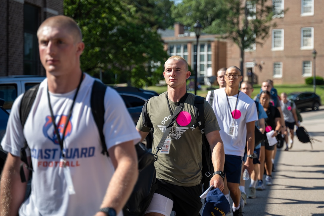U.S. Coast Guard Academy (USCGA) Class of 2029 swabs transit to their next check-in station at USCGA, New London, Connecticut, June 30, 2025. Day One marks the start of Swab Summer, an intensive seven-week program that prepares students for military and Academy life. (U.S. Coast Guard photo by Petty Officer Third Class Leo Avila.)