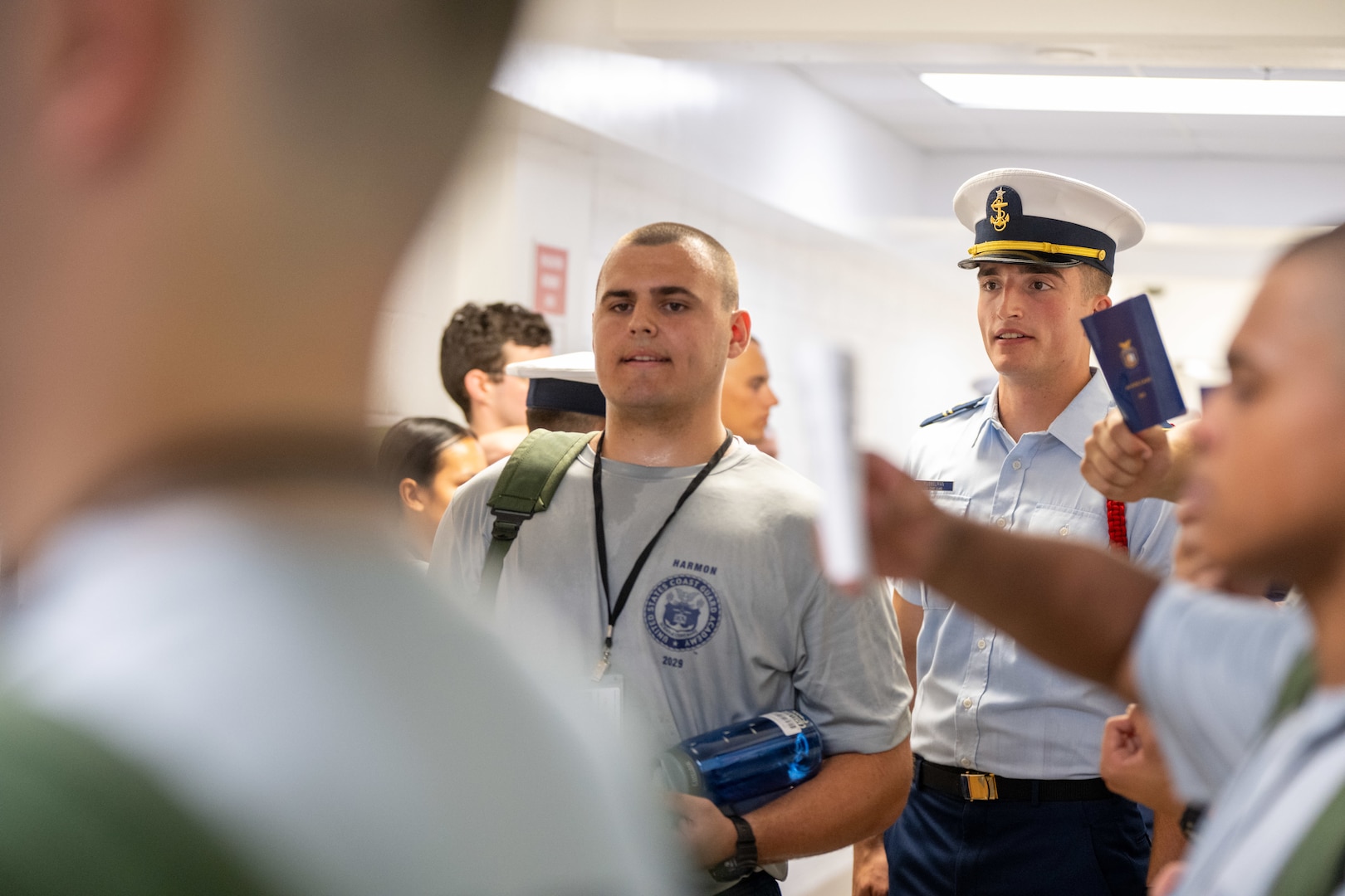 U.S. Coast Guard Academy (USCGA) cadet cadre give orders to the incoming Class of 2029 during Day One at USCGA, New London, Connecticut, June 30, 2025. Day One marks the beginning of a seven-week training program that transforms swabs into cadets. (U.S. Coast Guard photo by Petty Officer Second Class Janessa Warschkow.)