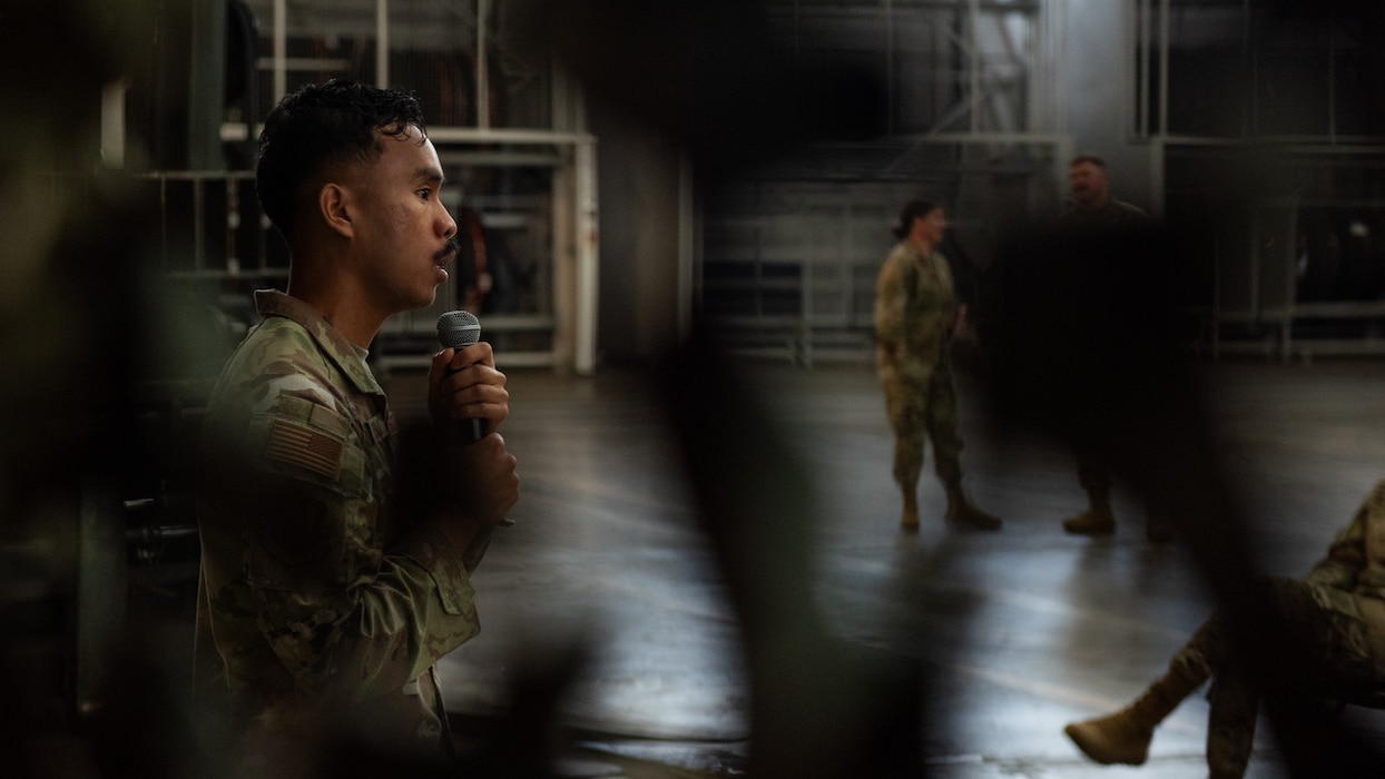 Officer briefs Airmen