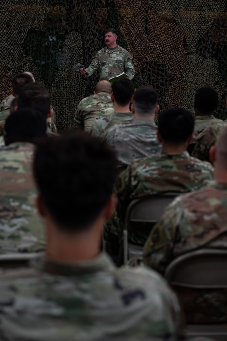 Officer briefs Airmen
