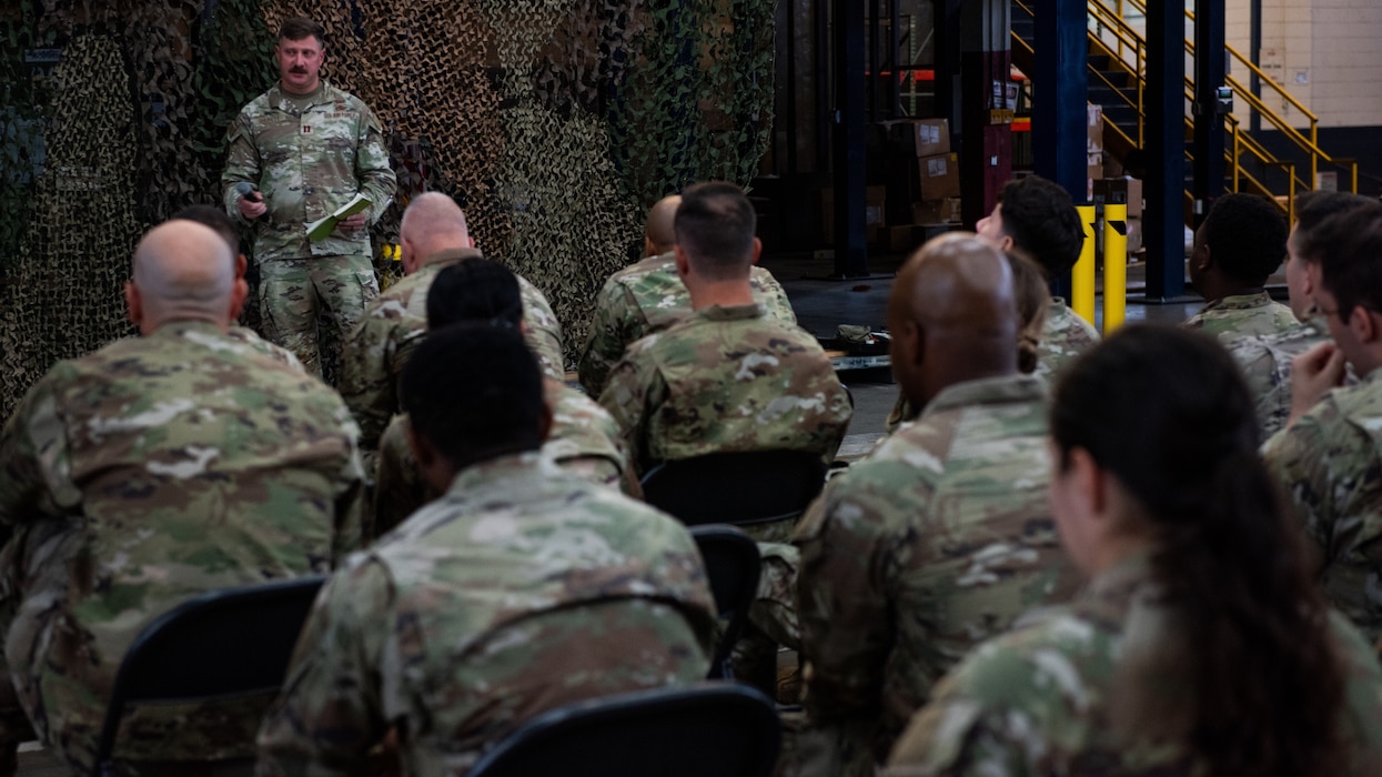 Officer briefs Airmen