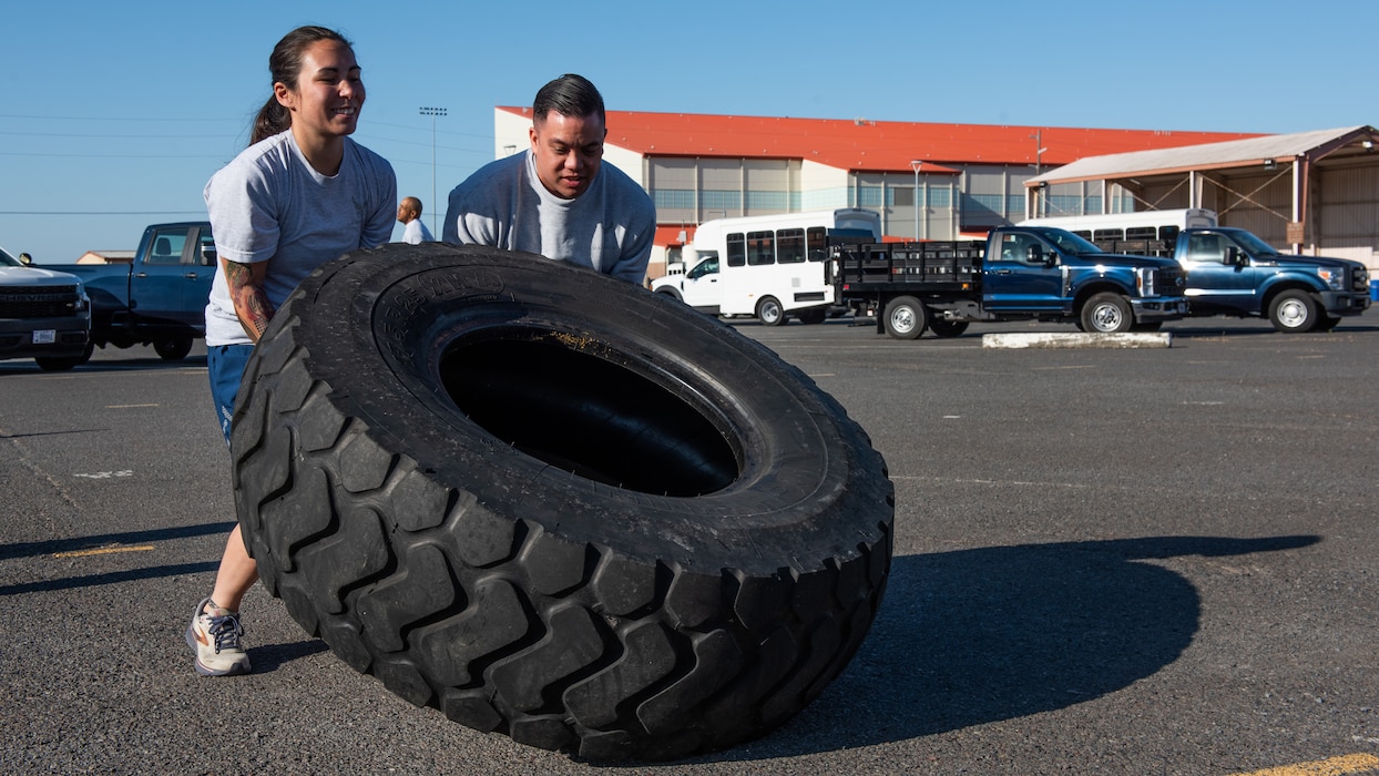 Airmen flip tire