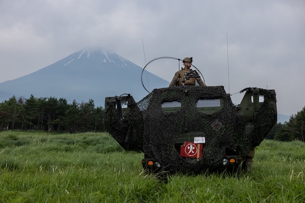U.S. Marine Corps Sgt. Dawson Dauzat operates an M142 High Mobility Artillery Rocket System during a field training exercise at Combined Arms Training Center Camp Fuji, Japan, June 8, 2025. The training demonstrates 3d Battalion, 12th Marine Regiment’s ability to rapidly deploy long-range fire throughout the Indo-Pacific. Dauzat, a native of Texas, is a field artillery cannoneer with 3d Battalion, 12th Marine Regiment, 3d Marine Division. (U.S. Marine Corps photo by Lance Cpl. Rodney Frye)