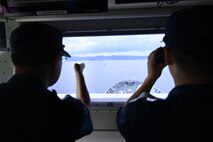 Japan Coast Guard members aboard the Japan Coast Guard Patrol Vessel Asanagi (PLH-43) identify an oscar mannequin in the water during a trilateral search and rescue exercise with the Japan and Philippine Coast Guards and the Legend-class U.S. Coast Guard Cutter Stratton (WMSL 752) in Kagoshima, Japan, June 20, 2025. Stratton is deployed and assigned to Destroyer Squadron (DESRON) 15, the Navy’s largest DESRON and the U.S. 7th Fleet’s principal surface force. U.S. Coast Guard Cutter Stratton is deployed to the Indo-Pacific to advance relationships with ally and partner nations to build a more secure and prosperous region with unrestricted, lawful access to the maritime commons. (U.S. Coast Guard photo by Senior Chief Petty Officer Matthew S. Masaschi)
