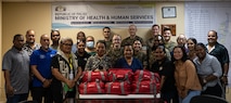 U.S. Marines and Sailors with Combat Logistics Battalion 15, Combat Logistics Regiment 17, 1st Marine Logistics Group, pose for a photo with medical staff and members of the Ministry of Health and Human Services during Koa Moana 25 at Belau National Hospital in Palau, June 26, 2025. Koa Moana 25 is an annual partnership in the Indo-Pacific region that strengthens established relationships, bolsters theater security cooperation, and enhances the resilience of our allies and partners through community outreach, medical and civic assistance, infrastructure improvement projects, and key leader exchanges. (U.S. Marine Corps photo by Cpl. Ryan Ramsammy)