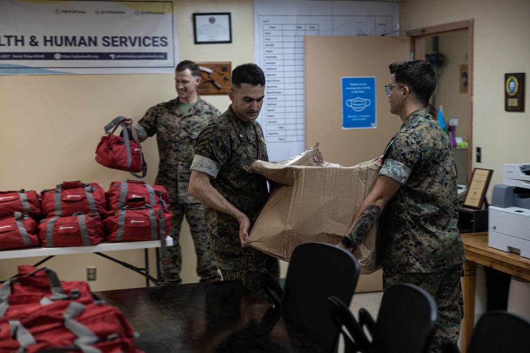 U.S. Navy Sailors with Combat Logistics Battalion 15, Combat Logistics Regiment 17, 1st Marine Logistics Group, deliver 100 first aid kits to medical staff at Belau National Hospital during Koa Moana 25 in Palau, June 26, 2025.