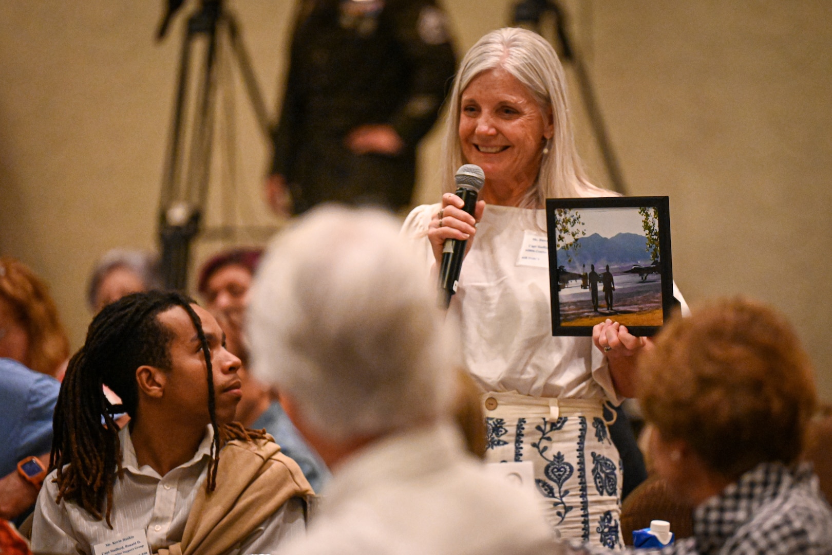 Family members of unaccounted for American service members from the Vietnam War share stories about their missing loved ones during a remembrance ceremony at the Vietnam War Annual Government Briefing, Omaha, Nebraska, June 26, 2025.