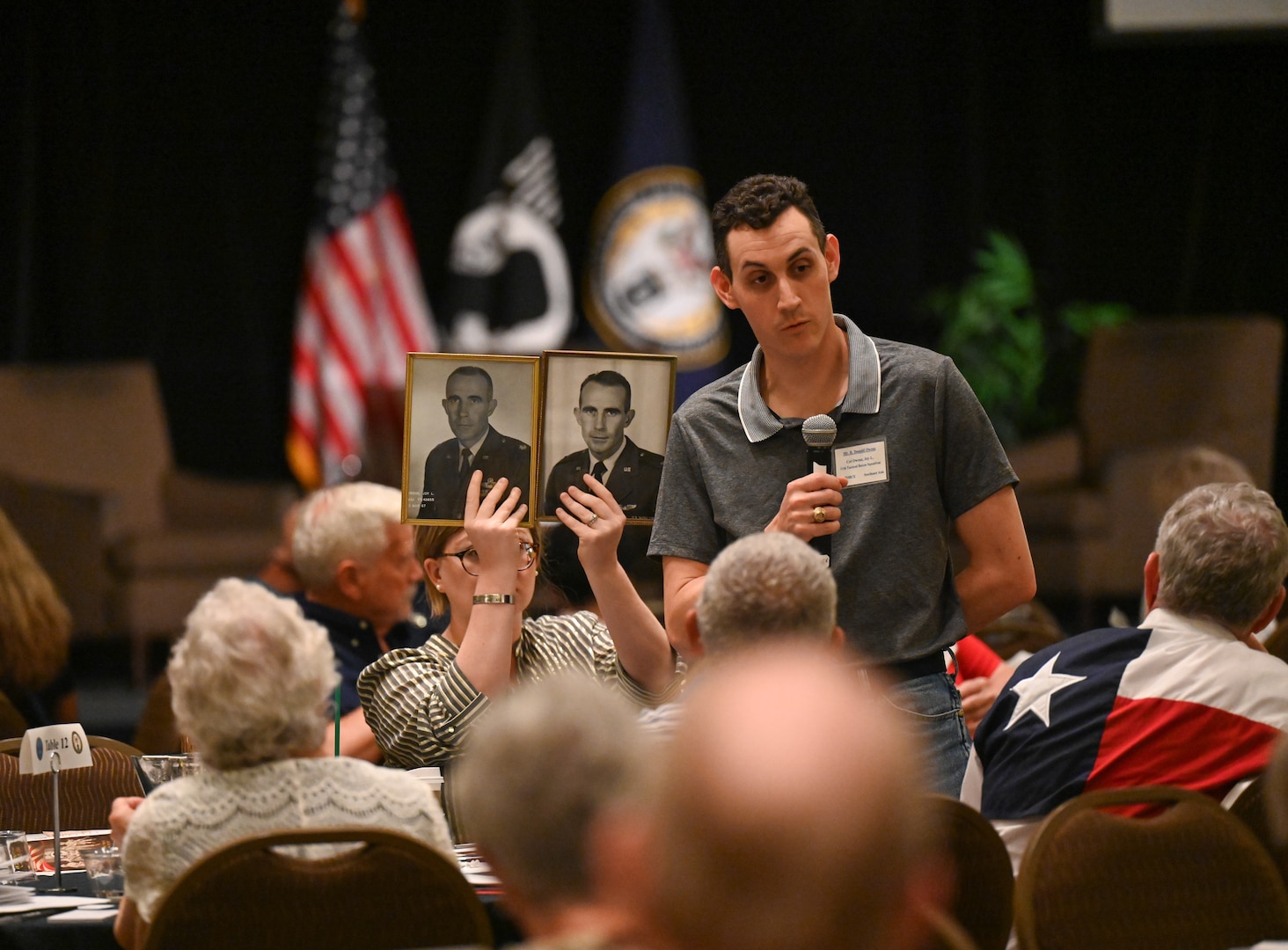 Family members of unaccounted for American service members from the Vietnam War share stories about their missing loved ones during a remembrance ceremony at the Vietnam War Annual Government Briefing, Omaha, Nebraska, June 26, 2025.