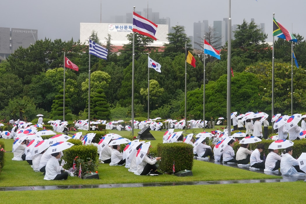 South Korean citizens honor the graves of fallen military service members at the 75th Commemoration of the start of the Korean War at the United Nations Memorial Cemetery-Korea in Busan, South Korea, June 25, 2025.