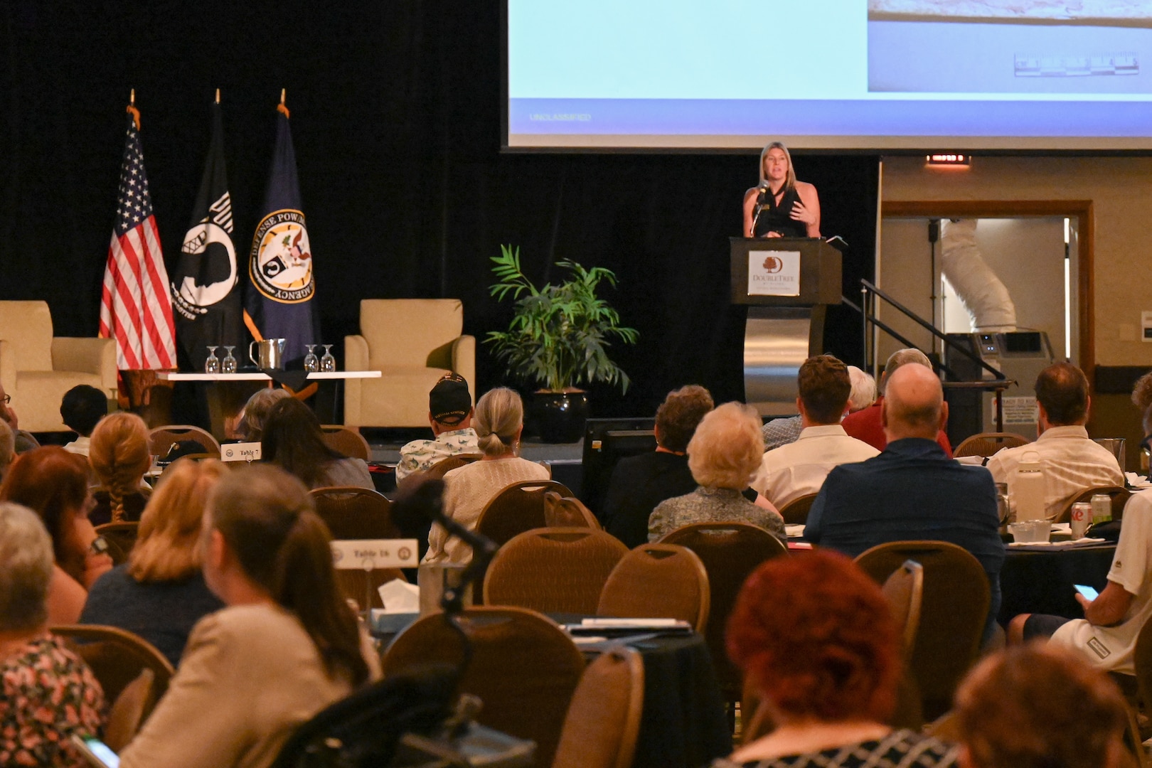 Dr. Debra Zinni, Defense POW/MIA Accounting Agency Hawaii Laboratory director, gives a brief at the Defense POW/MIA Accounting Agency's Vietnam War Annual Government Briefing, Omaha, Nebraska, June 27, 2025.