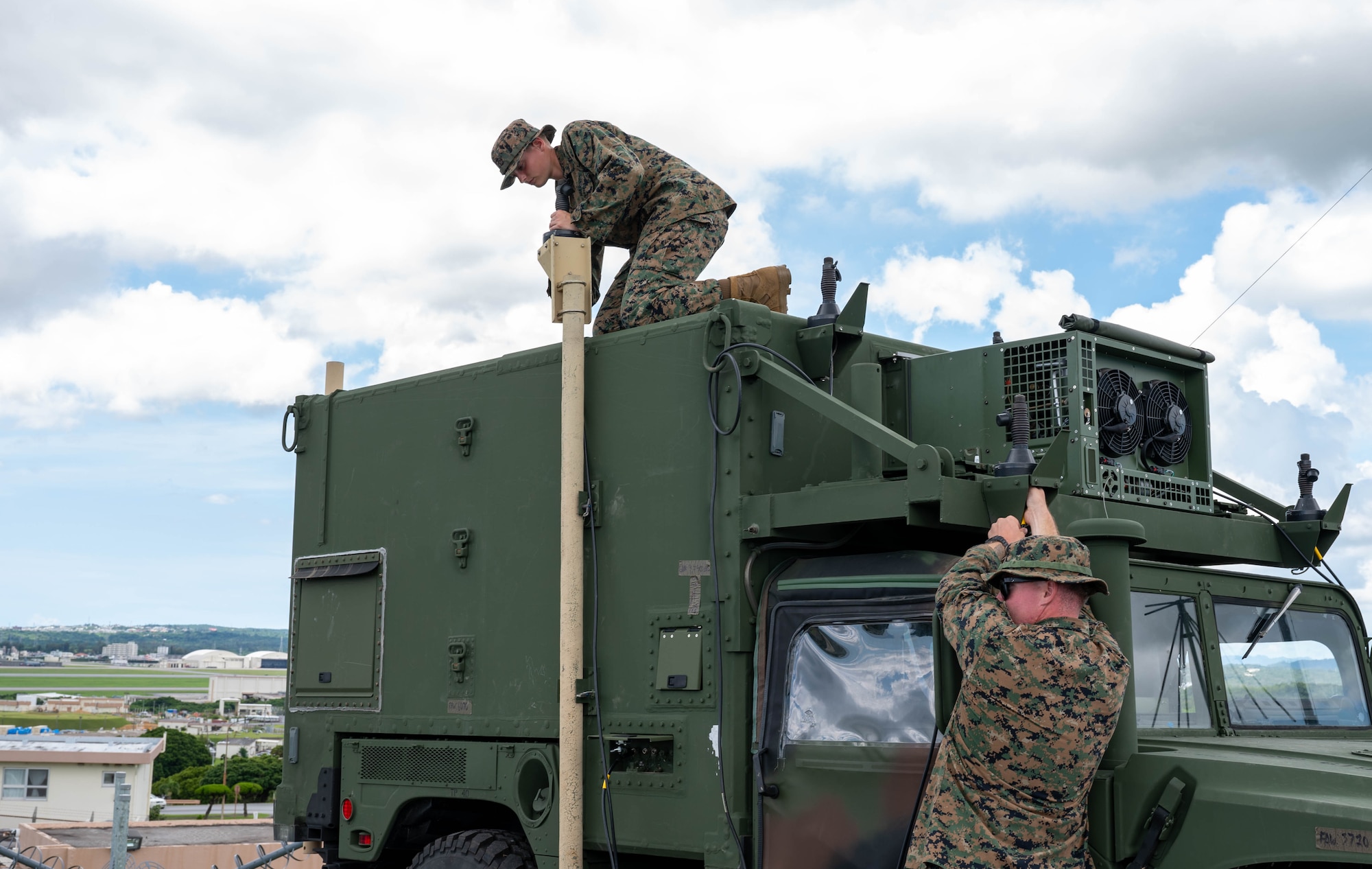 Service member disassebles vehicle.