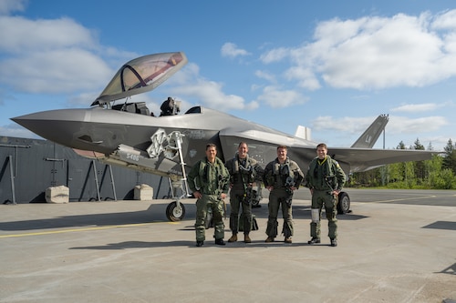 From left, Finnish Air Force Col. Saku Joukas, left, Lapland Air Wing commander, U.S. Air Force Brig. Gen. Jack Arthaud, 48th Fighter Wing commander, Capt. Hunter Robinson, 495th Fighter Squadron F-35A Lightning II pilot, and Finnish Air Force Lt. Col. Lasse Louhela, Fighter Squadron 11 commander, pose for a photo during exercise Atlantic Trident 25 at Rovaniemi Air Base, Finland, June 16, 2025. Atlantic Trident 25 allows the U.S., U.K., France and Finland to train in an interoperable environment, refining operational integration and ensuring Allied forces can seamlessly secure the Euro-Atlantic region. (U.S. Air Force photo by Senior Airman Christopher Campbell)
