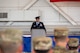U.S. Air Force Colonel Zak Blom speaks to audience during a change of command ceremony.