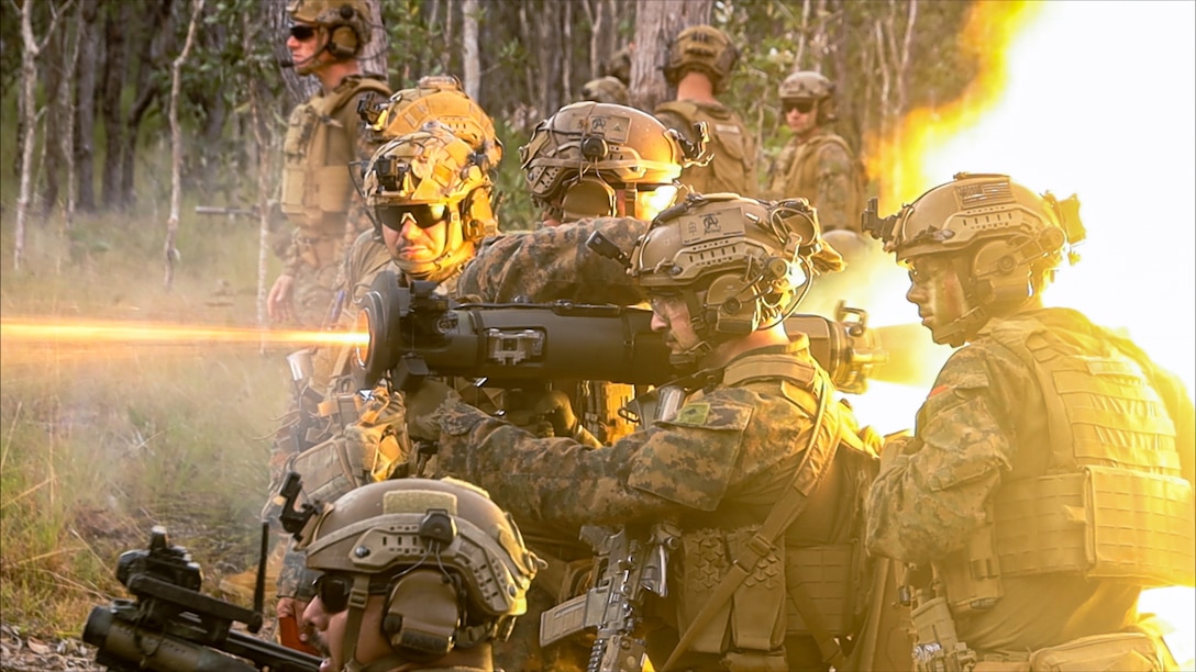 U.S. Marines with Animal Company, Battalion Landing Team 1st Battalion, 7th Marine Regiment, 31st Marine Expeditionary Unit, fire a Multi-purpose Anti-tank Anti-personnel Weapon System at a simulated machine gun bunker during a live-fire platoon attack exercise at Shoalwater Bay training area, Queensland, Australia, June 23, 2025. Marines participated in training that showcased a high degree of tactical proficiency, lethal firepower, and reinforced their combat readiness through realistic scenario-based training. The 31st MEU is operating aboard the ships of the USS America Amphibious Ready Group in the 7th Fleet area of operations, the U.S. Navy’s largest forward deployed numbered fleet, and routinely interacts and operates with allies and partners in preserving a free and open Indo-Pacific region. (U.S. Marine Corps photo by Lance Cpl. Victor Gurrola)