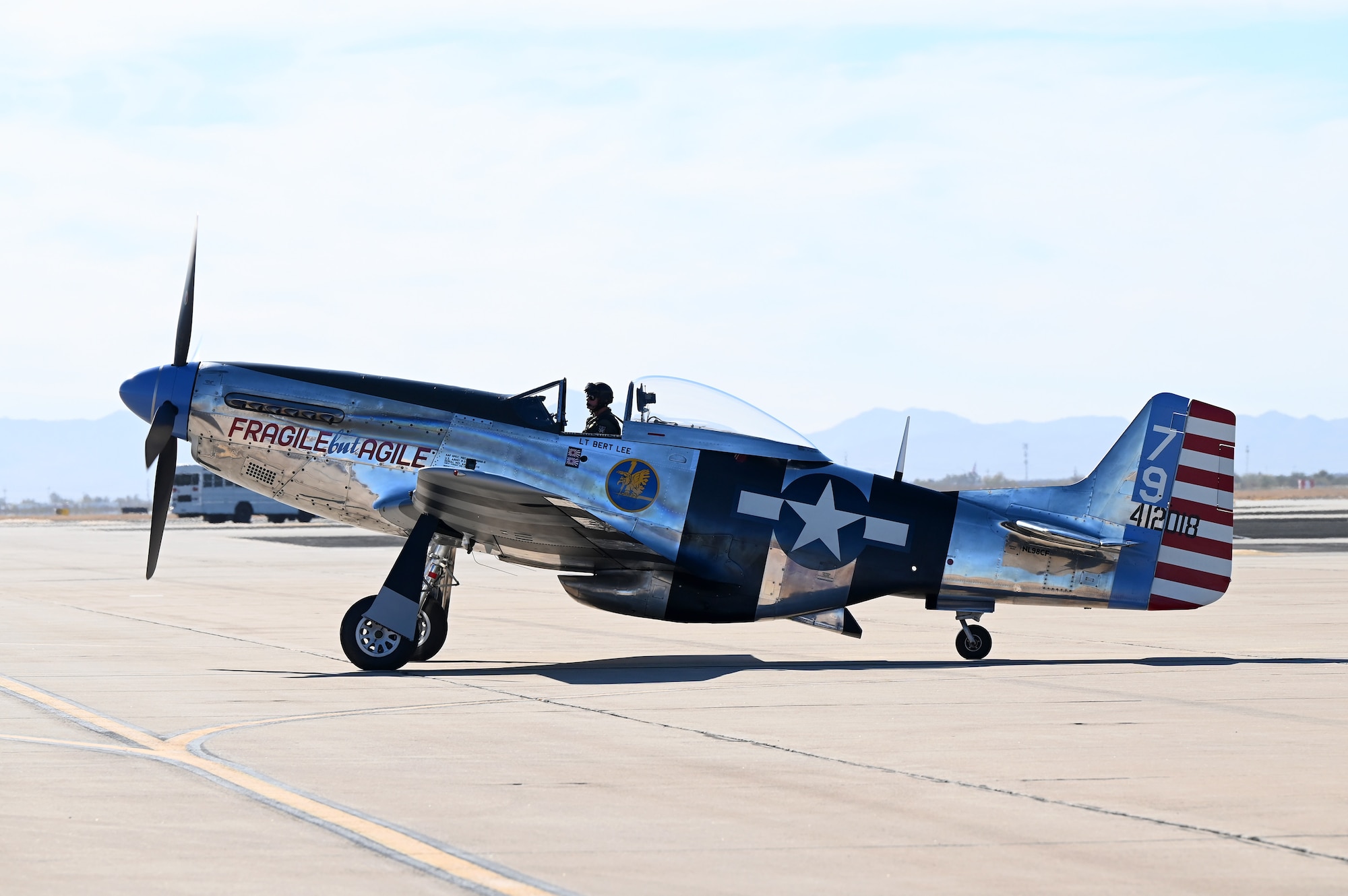 A P-51 Mustang aircraft taxis on the runaway after performing an aerial formation during Heritage Flight Training Course at Davis-Monthan Air Force Base, Arizona, March 1, 2025. Demo teams dedicated their last flight of the day to past and present members of the U.S. Armed Forces. (U.S. Air Force photo by Senior Airman Andrew Garavito)