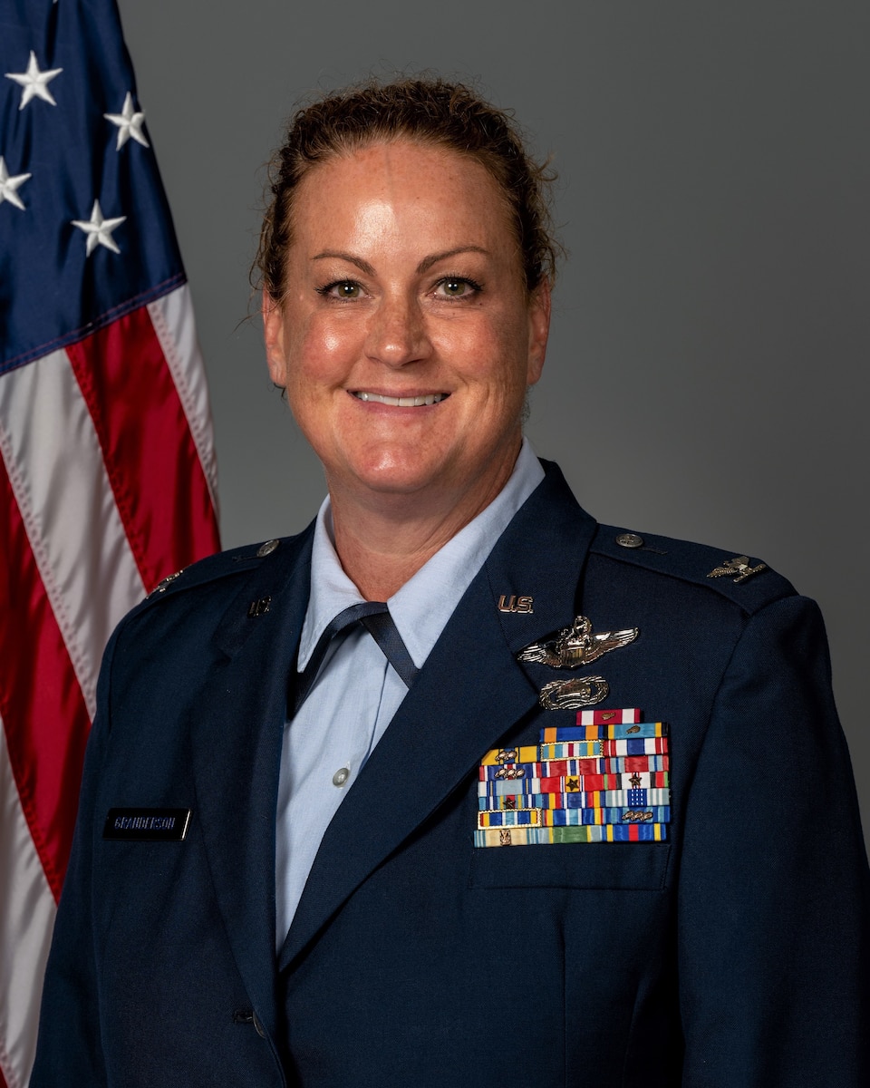 Am official Air Force photo of a woman in service dress.
