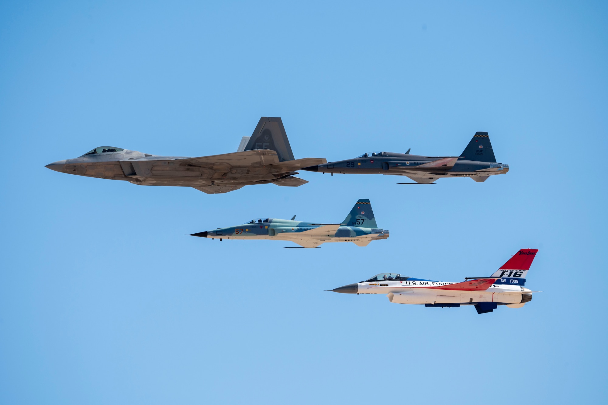 A U.S. Air Force F-22 Raptor aircraft, Northrop F-5,F-16 Fighting Falcon aircraft fly in formation at Davis-Monthan Air Force Base, Arizona, Mar. 1, 2025. Heritage Flights displayed the evolution of America’s air combat capabilities. (U.S. Air Force photo by Airman Samantha Melecio)
