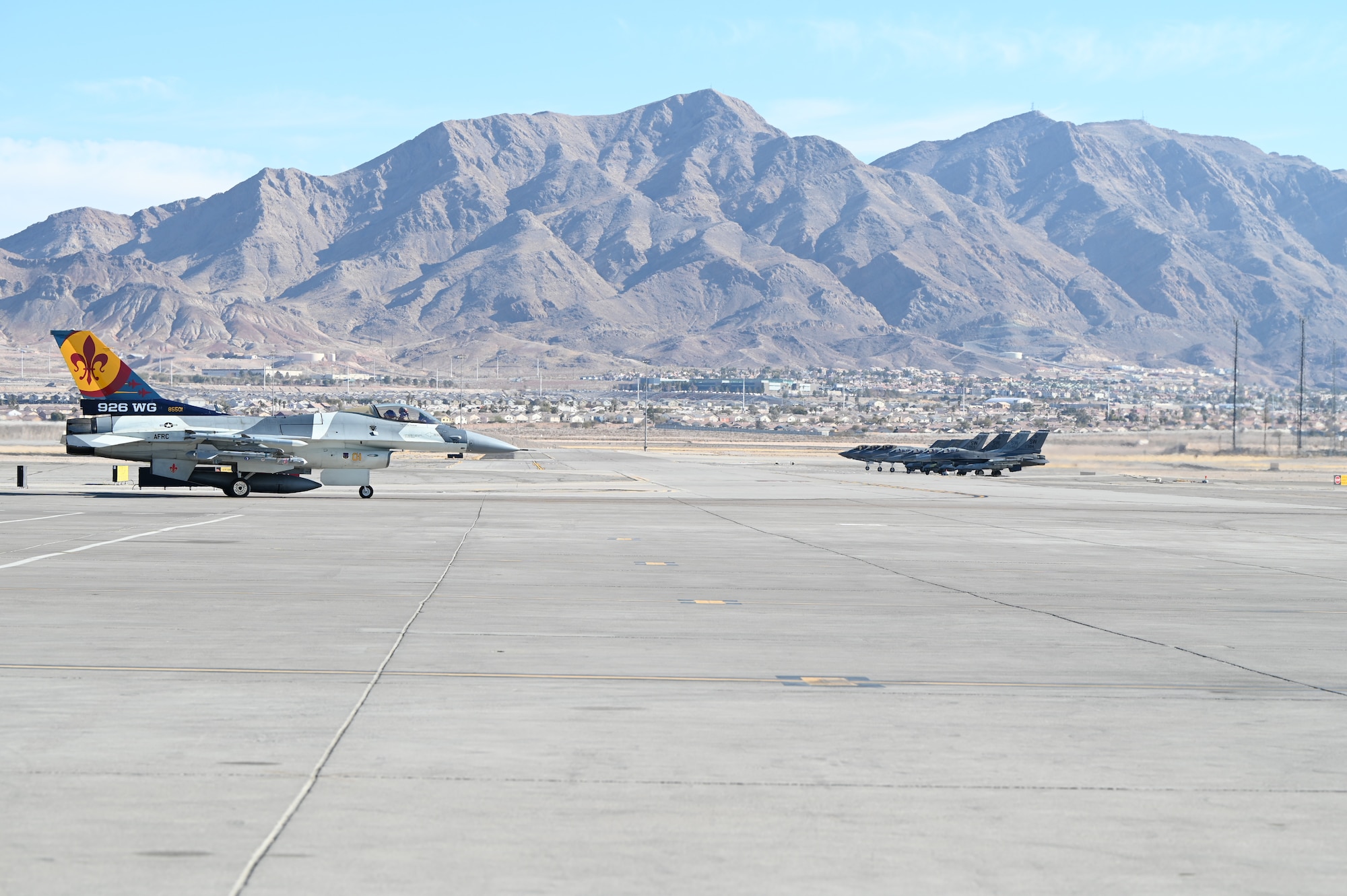926th Wing aircraft stand in front of a mountain range during exercise Red Flag 25-1