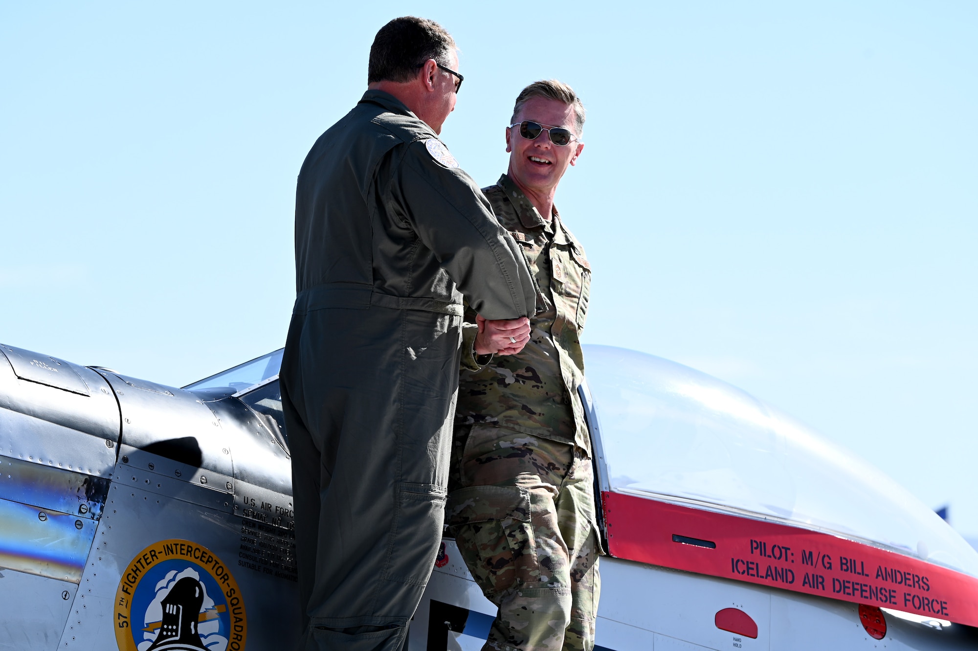 U.S. Air Force Airmen from the F-16 Viper demonstration team perform preflight checks during Heritage Flight Training Course at Davis-Monthan Air Force Base, Arizona, March 1, 2025. Heritage flights are flown with past and current U.S. Air Force aircraft to honor the past, present and future of American airpower. (U.S. Air Force photo by Senior Airman Andrew Garavito)
