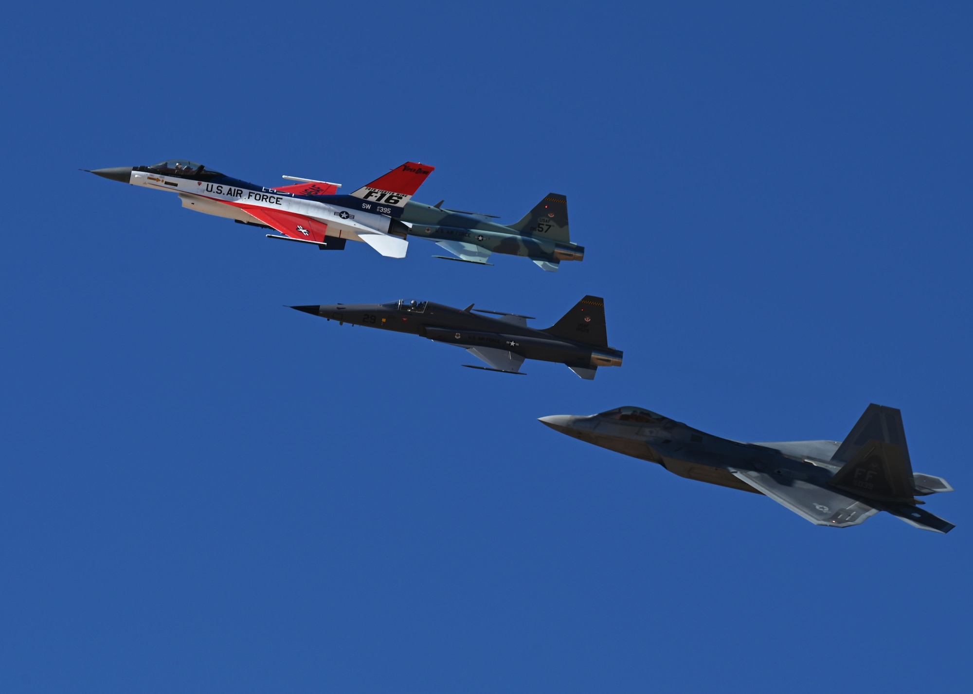 A heritage flight formation flies during the Heritage Flight Training Course at Davis-Monthan Air Force Base, Arizona, March 1, 2025.  The HFTC showcases Air Power and military capabilities while certifying Air Combat Command Demonstration Teams for the 2025 airshow season. (U.S. Air Force photo by Staff Sgt. Abbey Rieves)