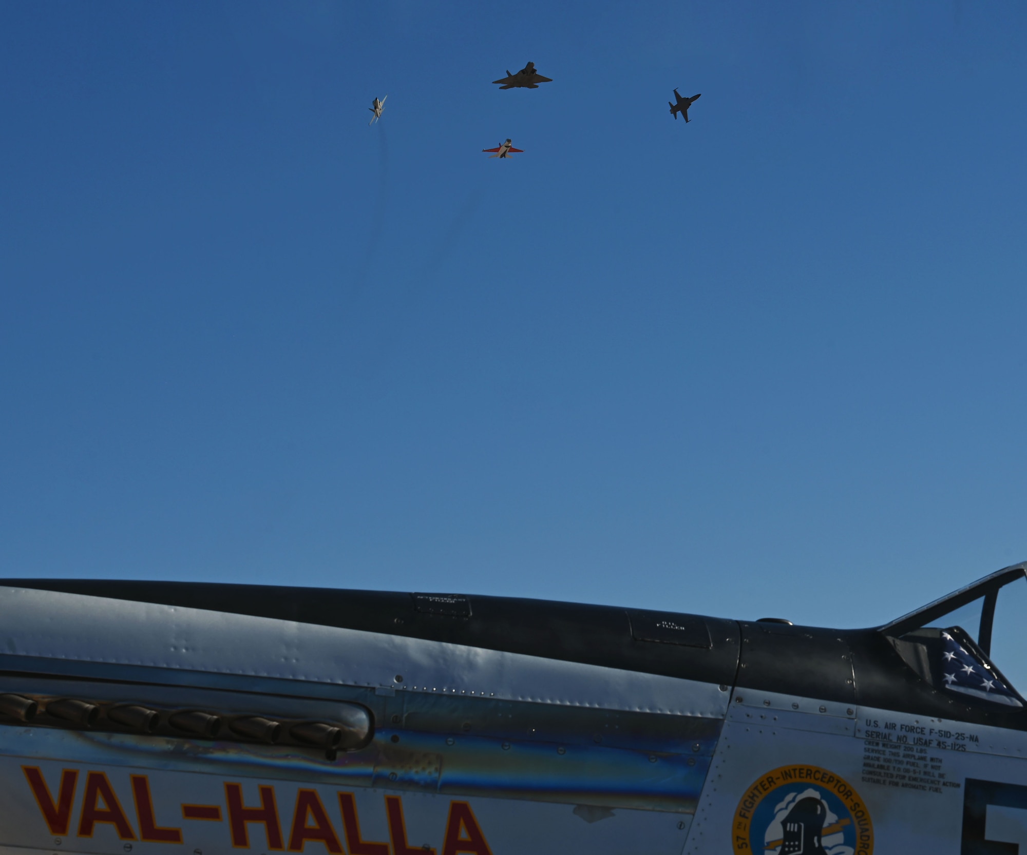 A heritage flight formation flies during the Heritage Flight Training Course at Davis-Monthan Air Force Base, Arizona, March 1, 2025. Heritage flights raise public awareness of the Air Force mission and commemorate its history. (U.S. Air Force photo by Staff Sgt. Abbey Rieves)