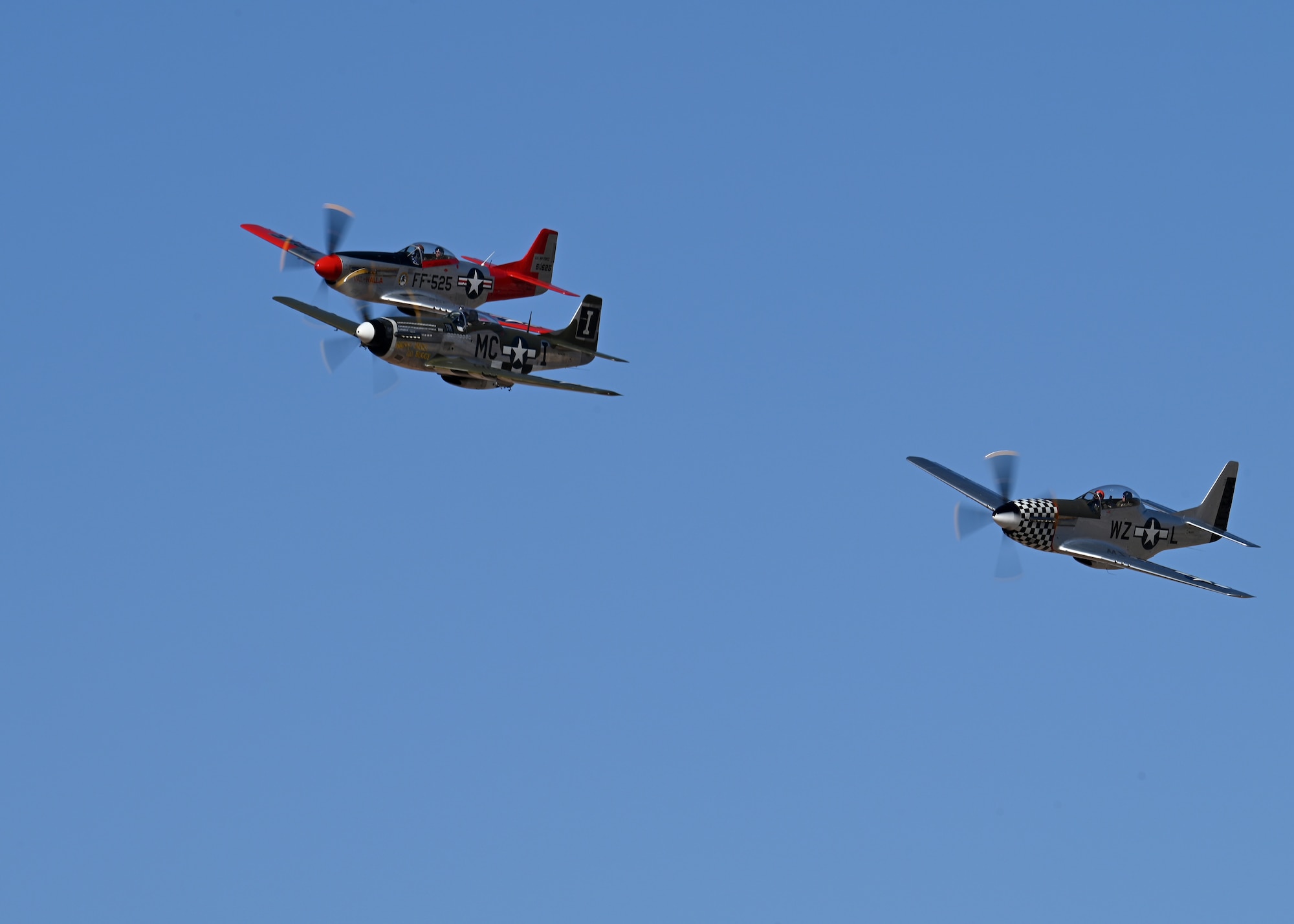 A heritage flight formation flies during the Heritage Flight Training Course at Davis-Monthan Air Force Base, Arizona, March 2, 2025.  The Air Combat Command aircraft flying in this year’s training were the F-35 Lightning II, the F-22 Raptor, F-16 Fighting Falcon, F-105 Thunderchief, P-51 Mustang and the P-38 Lightning. (U.S. Air Force photo by Staff Sgt. Abbey Rieves)