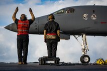 U.S. Air Force Airmen assigned to the 34th Expeditionary Bomb Squadron send off a U.S. Air Force B1-Lancer assigned to the 34th Expeditionary Bomb Squadron in support of Pacific Air Forces’ Bomber Task Force mission at Misawa Air Base, Feb. 20, 2025.