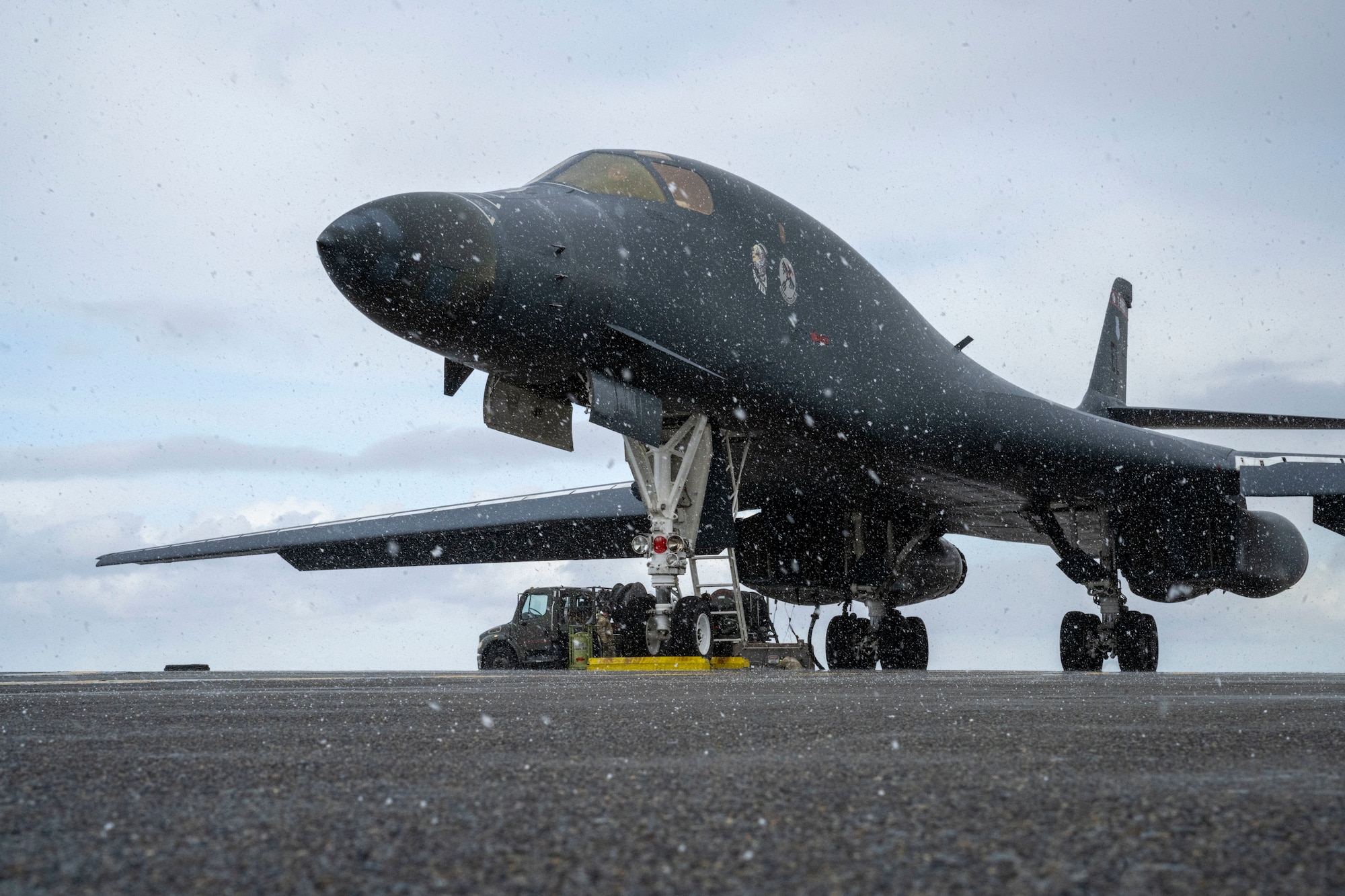 A U.S. Air Force B1-Lancer assigned to the 34th Expeditionary Bomb Squadron sits on a runway during post-flight maintenance in support of Pacific Air Forces’ Bomber Task Force mission at Misawa Air Base, Feb. 20, 2025.