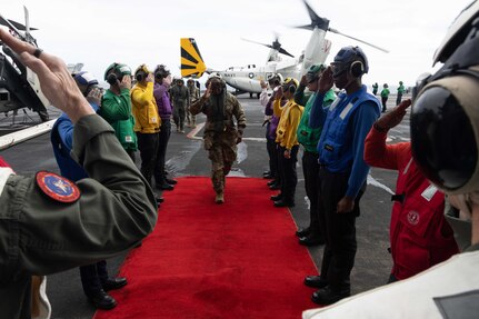 250301-N-TD381-1033 AT SEA (March 1, 2025) U.S. Army Gen. Xavier T. Brunson, commander, United Nations Command, Combined Forces Command, United States Forces Korea, arrives aboard the Nimitz-class aircraft carrier USS Carl Vinson (CVN 70), March 1, 2025. Vinson, the flagship of Carrier Strike Group 1, is underway conducting routine operations in the U.S. 7th Fleet area of operations. (U.S. Navy photo by Mass Communication Specialist 2nd Class Isaiah B. Goessl)