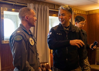 250301-N-TD381-2389 AT SEA (March 1, 2025) U.S. Navy Capt. Matthew Thomas, commanding officer, Nimitz-class aircraft carrier USS Carl Vinson (CVN 70), left, speaks with Republic of Korea Rear Adm. Kim Ji-Hoon, director, Maritime Operations Center, in the commanding officer’s in-port cabin aboard Vinson, March 1, 2025. Vinson, the flagship of Carrier Strike Group ONE, is underway conducting routine operations in the U.S. 7th Fleet area of operations. (U.S. Navy photo by Mass Communication Specialist 2nd Class Isaiah B. Goessl)