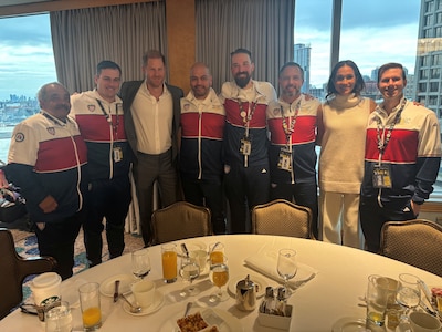 Carlos Valerio, fourth from left, and several of his Team U.S. teammates are pictured with Prince Harry, Duke of Sussex, and his wife, Meghan Markle, during a reception at the 2025 Invictus Games, held Feb. 8-16 in Vancouver and Whistler, Canada. Prince Harry founded the international games in 2014, geared toward wounded, injured and sick military service personnel, active duty or veterans.