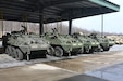 Upgraded double-V hull Strykers sit at Fort Indiantown Gap, Pa., on Feb. 27, 2005. The 56th Stryker Brigade Combat Team is receiving 324 upgraded Strykers and 300 Joint Light Tactical Vehicles as part of a program to modernize the brigade. (Pennsylvania National Guard photo by Brad Rhen)