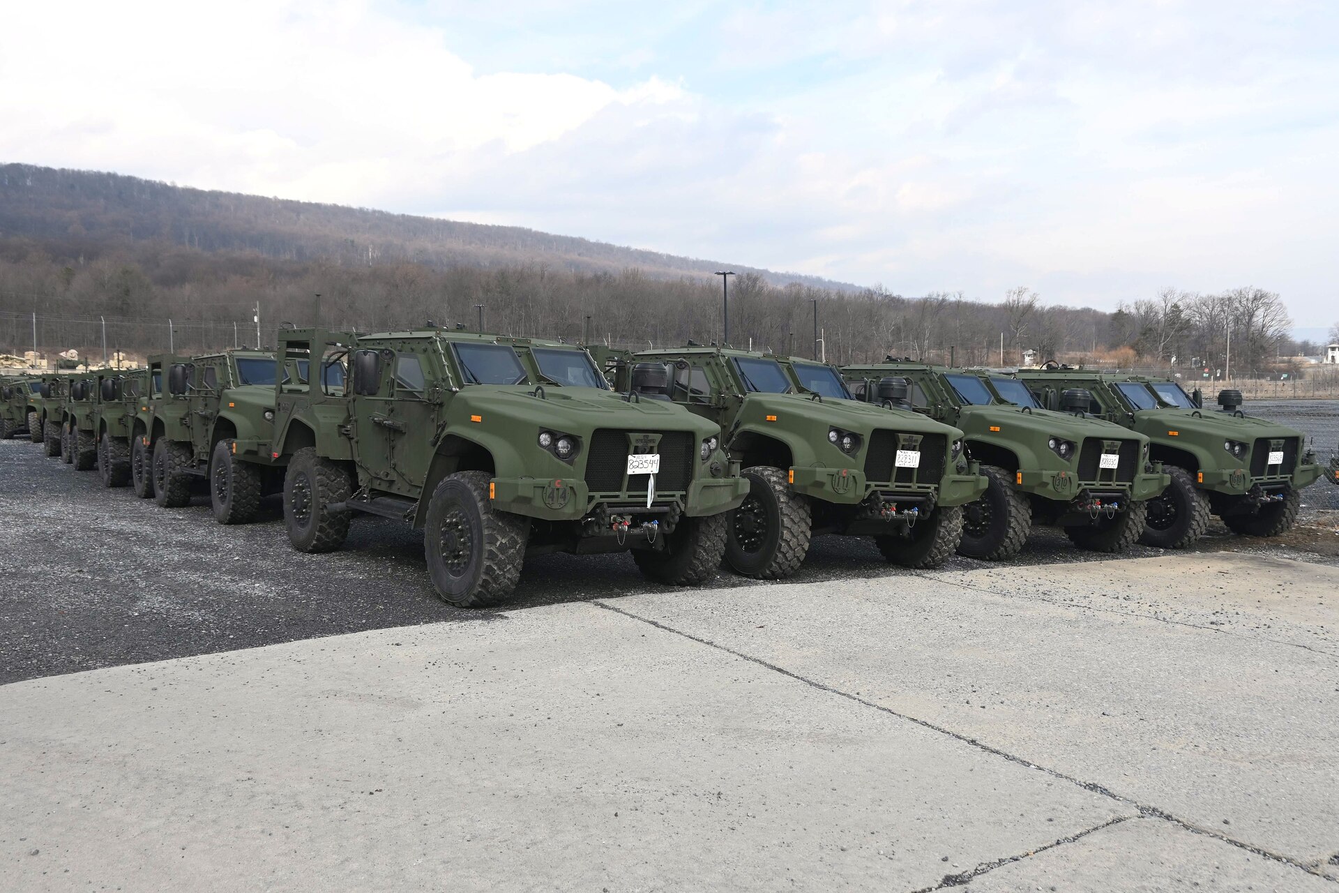 Joint Light Tactical Vehicles, or JLTVs, sit at Fort Indiantown Gap, Pa., on Feb. 27, 2005. The 56th Stryker Brigade Combat Team is receiving 324 upgraded Stryker vehicles and 300 JLTVs as part of a program to modernize the brigade. (Pennsylvania National Guard photo by Brad Rhen)