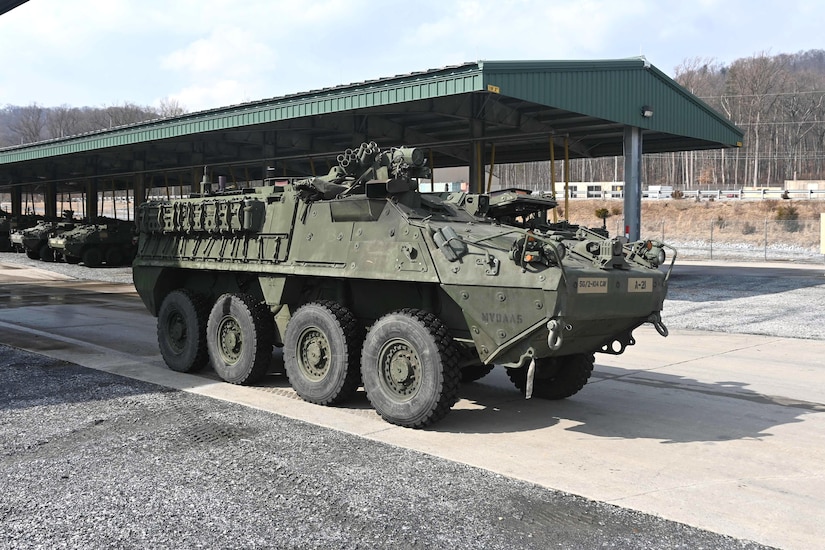 An upgraded double-V hull Stryker is moved from a storage yard to a maintenance bay at Fort Indiantown Gap, Pa., on Feb. 27, 2005. The 56th Stryker Brigade Combat Team is receiving 324 upgraded Strykers and 300 Joint Light Tactical Vehicles as part of a program to modernize the brigade. (Pennsylvania National Guard photo by Brad Rhen)