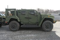A Joint Light Tactical Vehicles, or JLTV, sits at Fort Indiantown Gap, Pa., on Feb. 27, 2005. The 56th Stryker Brigade Combat Team is receiving 324 upgraded Stryker vehicles and 300 JLTVs as part of a program to modernize the brigade. (Pennsylvania National Guard photo by Brad Rhen)