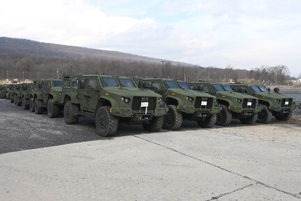 Joint Light Tactical Vehicles, or JLTVs, sit at Fort Indiantown Gap, Pa., on Feb. 27, 2005. The 56th Stryker Brigade Combat Team is receiving 324 upgraded Stryker vehicles and 300 JLTVs as part of a program to modernize the brigade. (Pennsylvania National Guard photo by Brad Rhen)