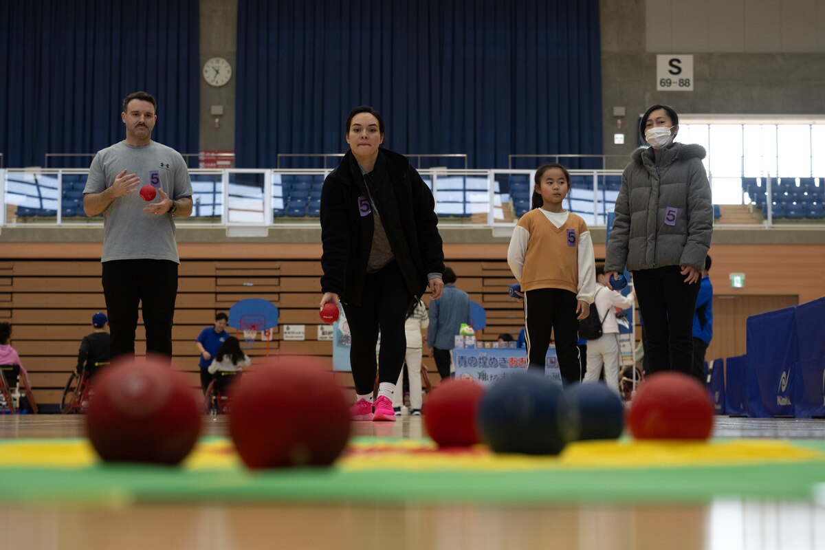 Airman throws a ball