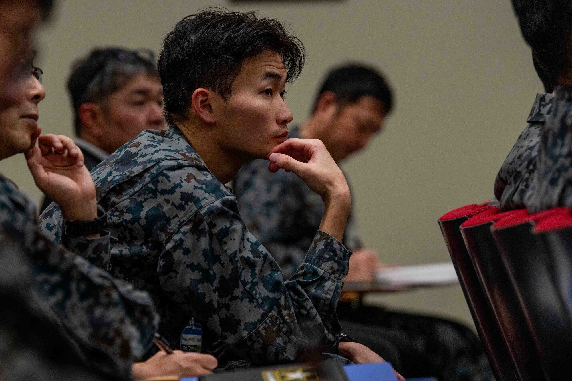 A Japan Air Self-Defense member attends a bilateral senior enlisted leadership training at Kadena Air Base, Japan, Feb. 18, 2025.