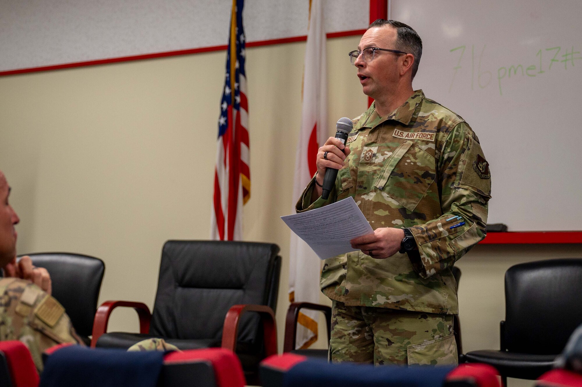 U.S. Air Force Chief Master Sgt. Shaun Campbell, 5th Air Force command chief, briefs during a bilateral senior enlisted leadership training at Kadena Air Base, Japan, Feb. 18, 2025.