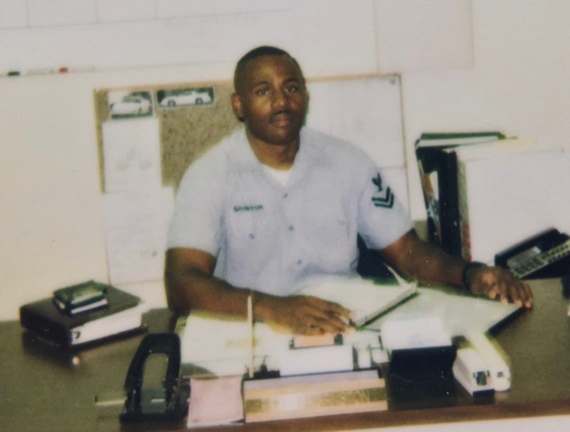 U.S. Air Force Col Rofelio Grinston, 5th Maintenance Group commander, poses for a photo when he was a Petty Officer in the U.S. Navy.