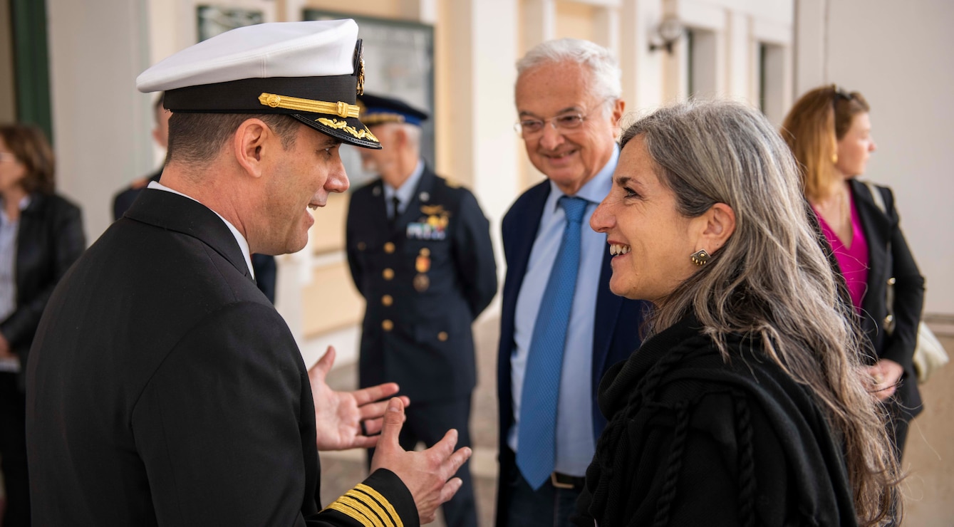 Capt. John Randazzo, Commander, Naval Support Activity (NSA) Naples, Italy, left, discusses the base installation facilities at Capodichino with Dr. Laura Lieto, Vice Mayor of the City of Naples, right, at NSA Naples, Italy, March 21, 2024.